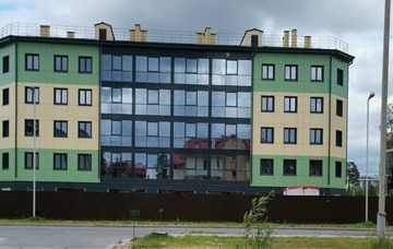 Витражное остекление многоквартирного дома СИАЛ КП50+окна СИАЛ КП45 цвет 7024
